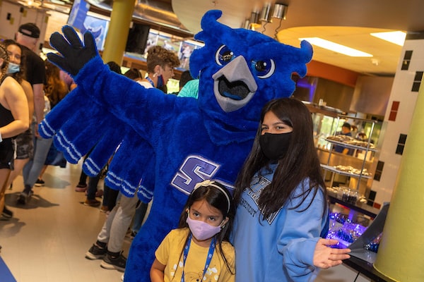 Owl mascot with kids